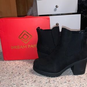 Heeled black booties